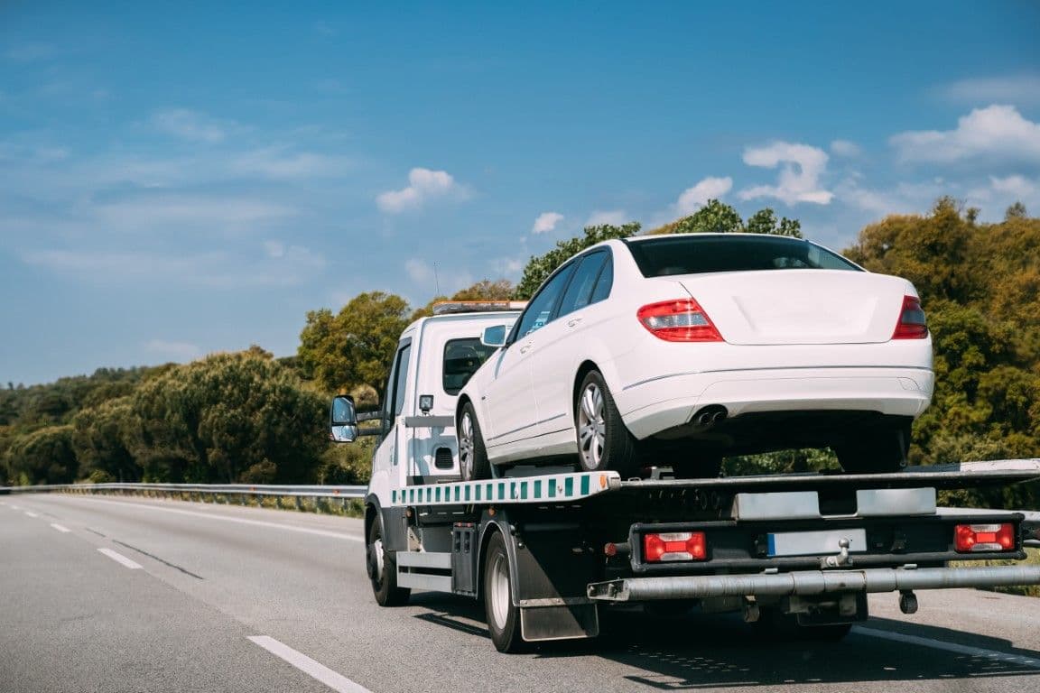 Tow truck on the road in Palm Bay, Florida